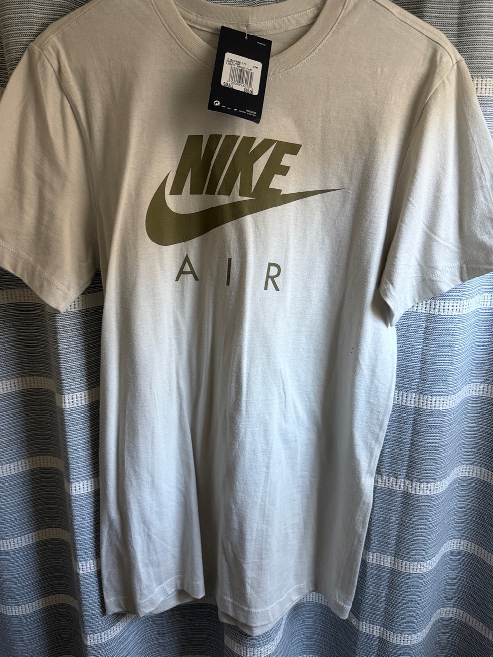 Nike T-Shirt in Light Beige with Olive Logo